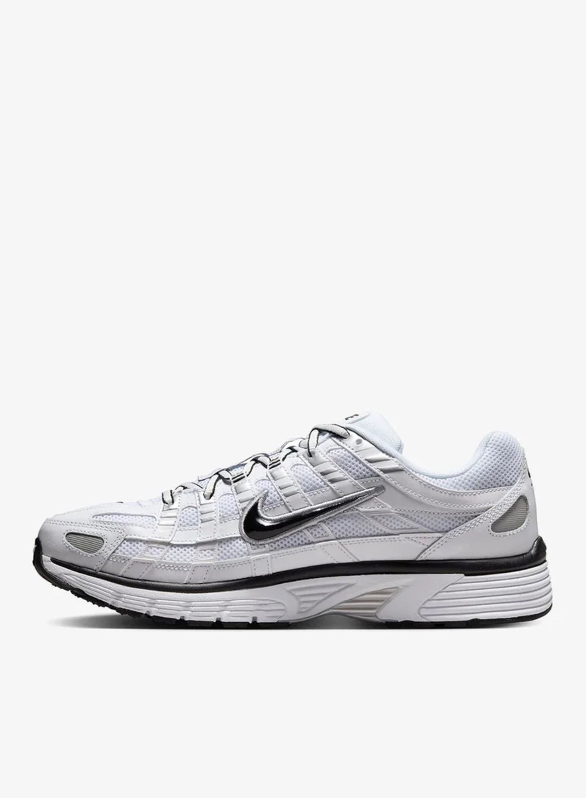 A Nike running shoe in white and light gray with black accents, shown from the side profile against a light gray background.